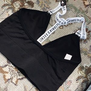 A small black  a PINK/ Victoria secret bra